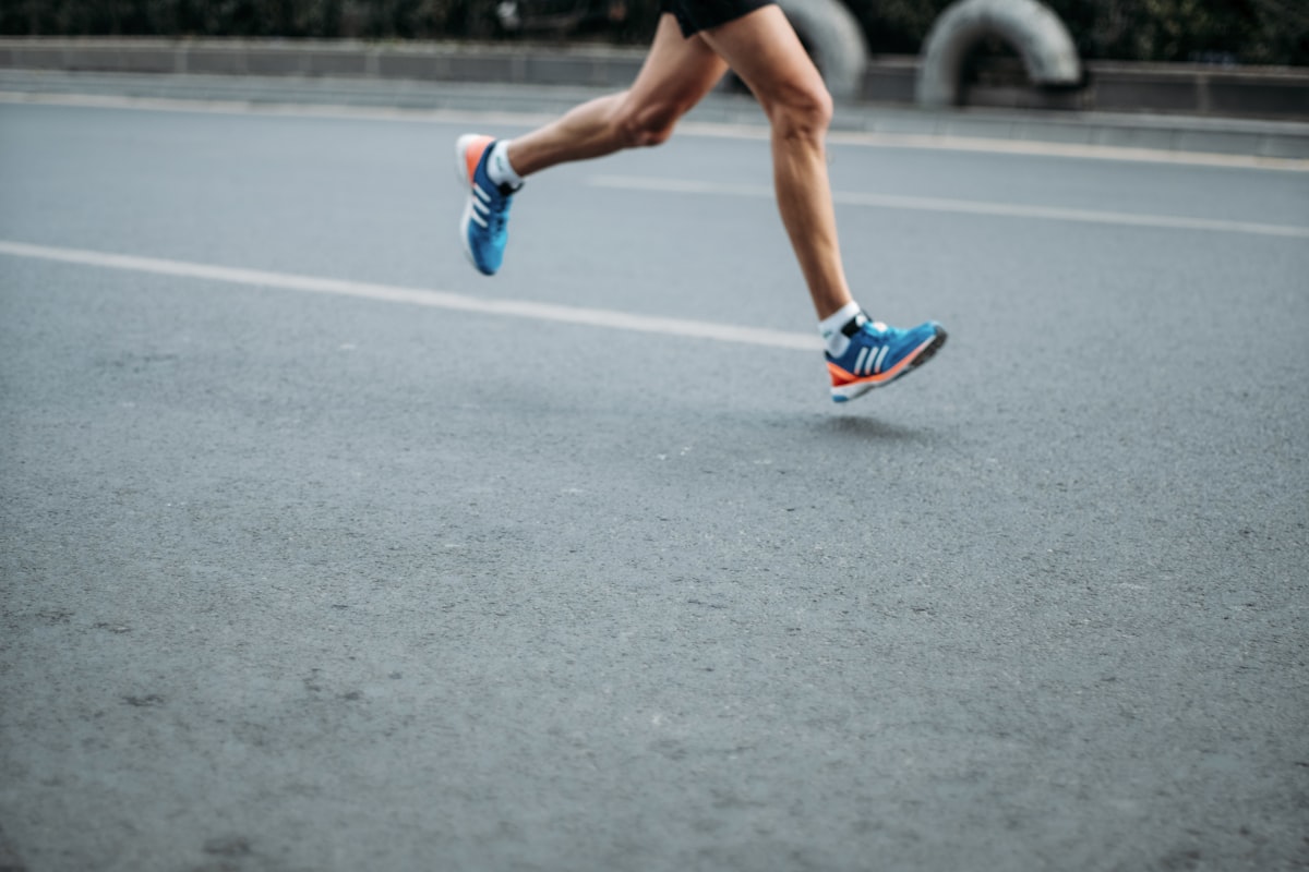 Runner wearing athletic shoes during recovery from bunion surgery returning to training at Sole Foot and Ankle Valparaiso IN