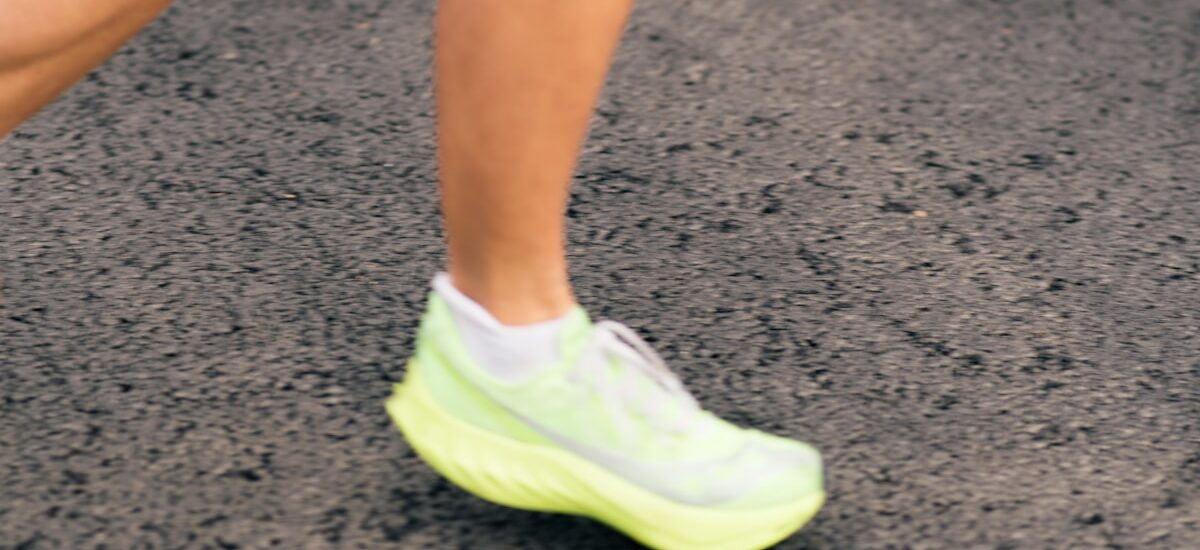Runner's foot in athletic shoe representing return to running after bunion surgery at Sole Foot and Ankle Valparaiso IN