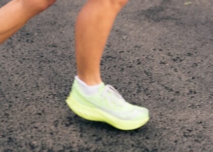 Runner's foot in athletic shoe representing return to running after bunion surgery at Sole Foot and Ankle Valparaiso IN